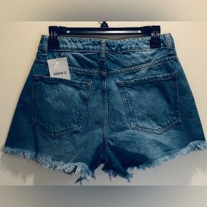 Forever 21 Denim Shorts frayed front in back pockets . Comfortable size 26